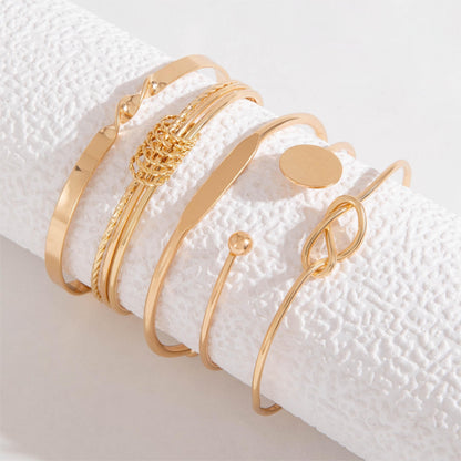 Amelise | Vrouwen minimalistische armbanden set met glanzende geometrie | Goud
