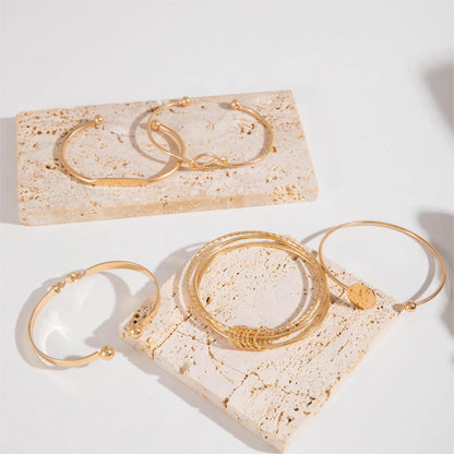 Amelise | Vrouwen minimalistische armbanden set met glanzende geometrie | Goud