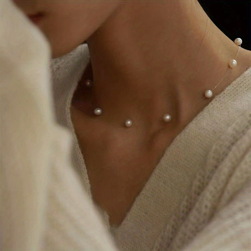 Lunelle | Dames minimalistische parelketting met onzichtbare draad | Wit