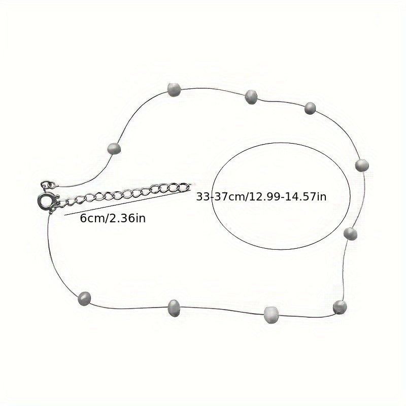 Lunelle | Dames minimalistische parelketting met onzichtbare draad | Wit